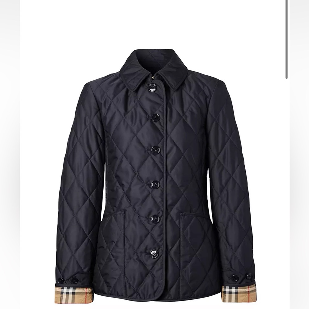 Women’s 100% authentic Burberry coat with tags and hanger!
